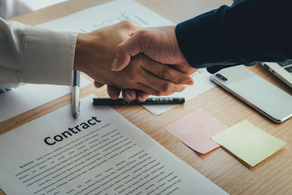 business contract signing international trade
